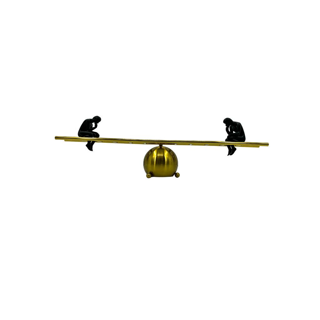 Balancing Sculpture, Metallic Gold and Black Figures on Wooden Beam